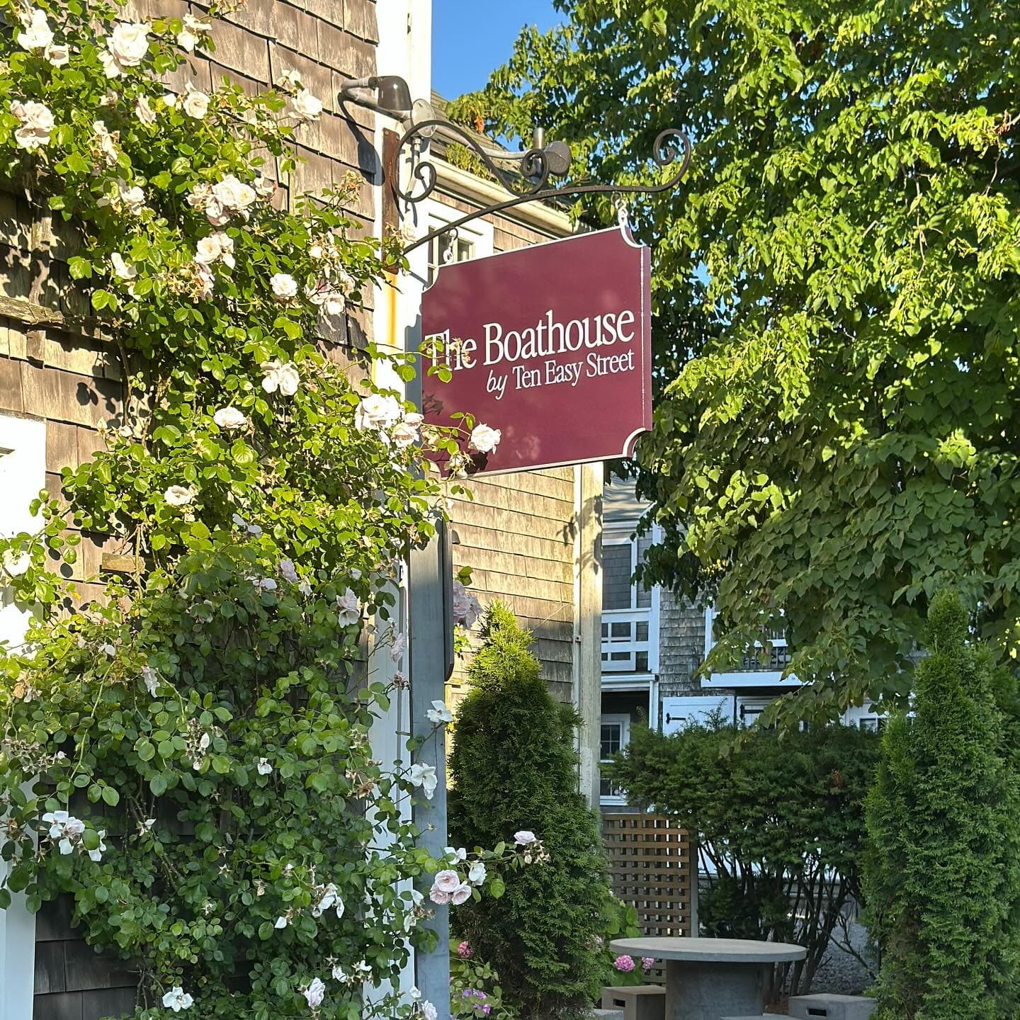 The Boathouse sign, Pelt Purple and White